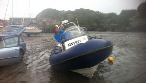 Rib on mud Illfracombe Harbour